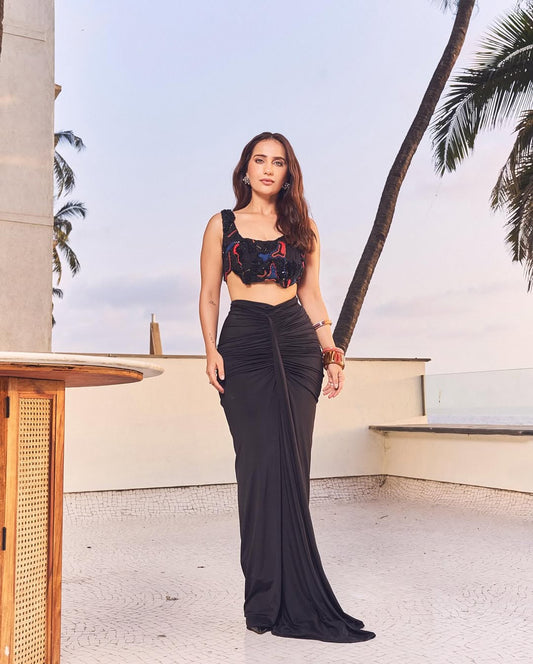 Kusha Kapila in the Noir draped skirt